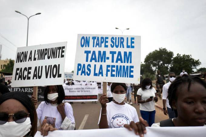 Protesters hold placards reading No to impunity in the face of rape and We hit on the tam-tam, not of women in Bamako on Saturday 26, 2020, during a demonstration against violence against women in Mali